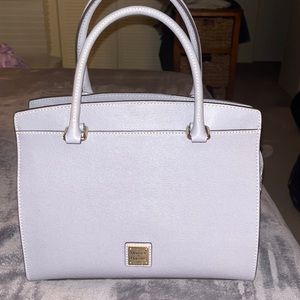 This is an oldie but goodie.  This classic handbag can be elegant and casual